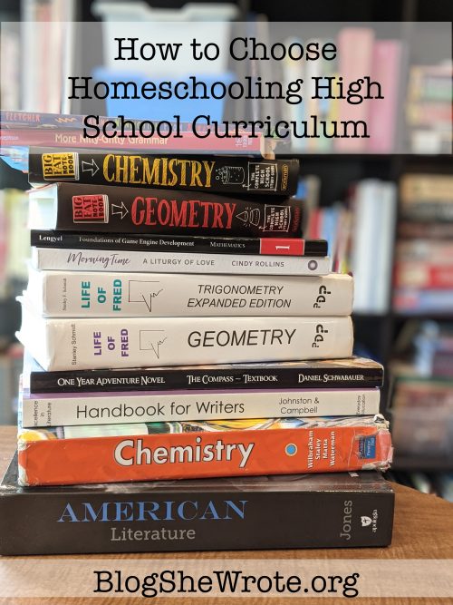 stack of high school texts books on a table in front of a bookshelf. How to choose Chemistry High School Curriculum for Homeschool